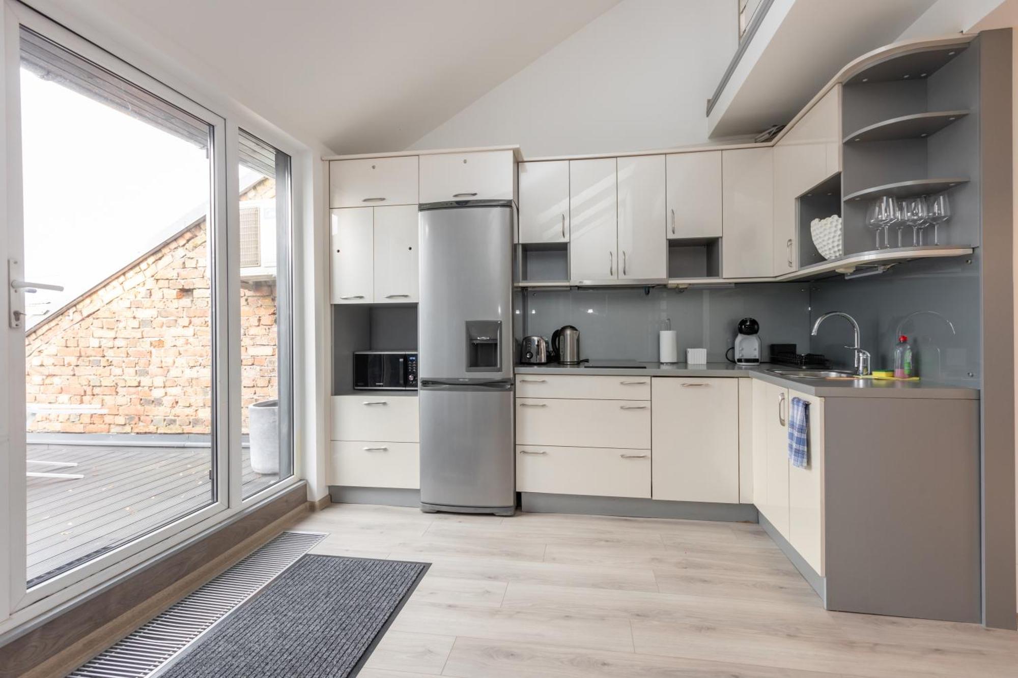 Penthouse Apartment With Terrace Riga Esterno foto